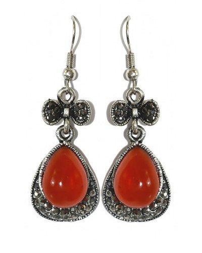 Сережки Fashion Jewelry. Під крапельне срібло. Камені: бордовий агат та гематит. Довжина: 4.8 см. Ширина: 16 мм.