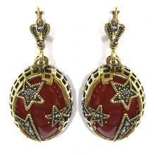 Сережки Fashion Jewelry. Під крапельне срібло. Камені: бордовий агат та гематит. Довжина: 5 см. Ширина: 23 мм.