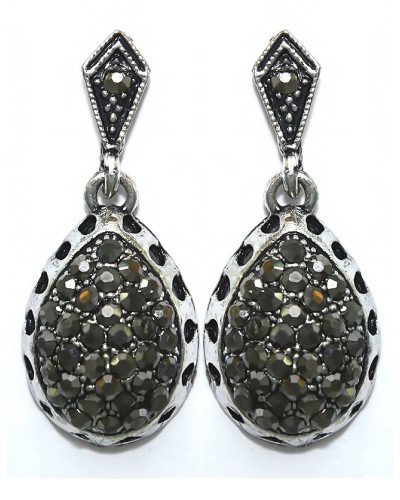 Сережки-гвоздики Fashion Jewelry. Під крапельне срібло. Камені: гематит. Довжина: 33 мм. Ширина: 14 мм.