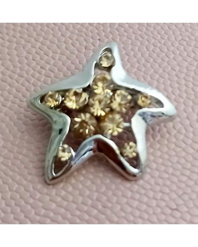 Брошка. Родій. Камені: циркон жовтого кольору. Діаметр: 2 см.
