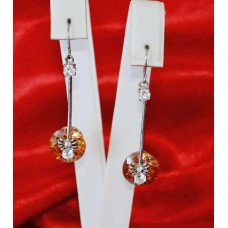 Сережки. Родій. Камені: білий та жовто-коричневий циркон. Довжина: 4.5 см. Ширина: 11 мм.