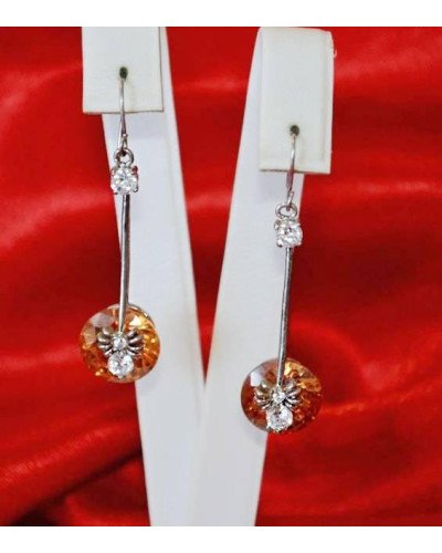 Сережки. Родій. Камені: білий та жовто-коричневий циркон. Довжина: 4.5 см. Ширина: 11 мм.