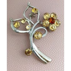 Брошка. Родій. Камені: жовто-коричневий циркон. Діаметр: 5 см.