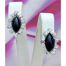 Сережки-кліпси. Родій. Камені: циркон. Довжина: 20 мм. Ширина: 12 мм