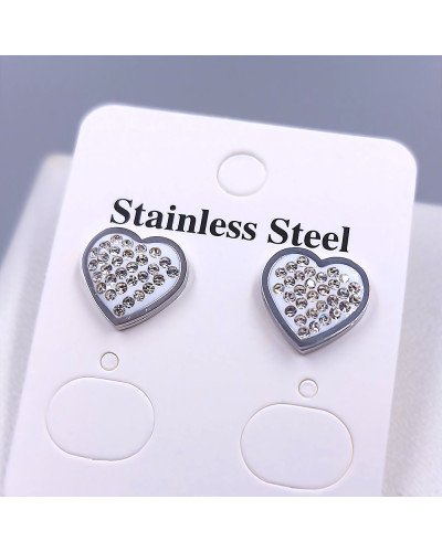 Сережки-гвоздики Stainless Steel з білою емаллю та цирконами. Сталь. Родій. Довжина: 11 мм. Ширина: 12 мм.