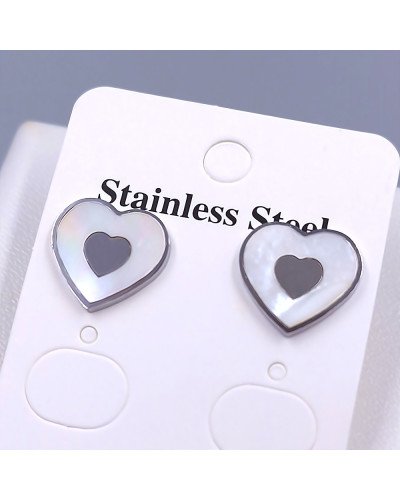 Сережки-гвоздики Stainless Steel з білою емаллю. Сталь. Родій. Довжина: 14 мм. Ширина: 14 мм.