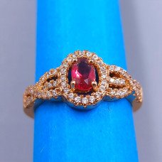Каблучка XР. Позолота 18К. Камені: білий та малиновий циркон. Є: 17р