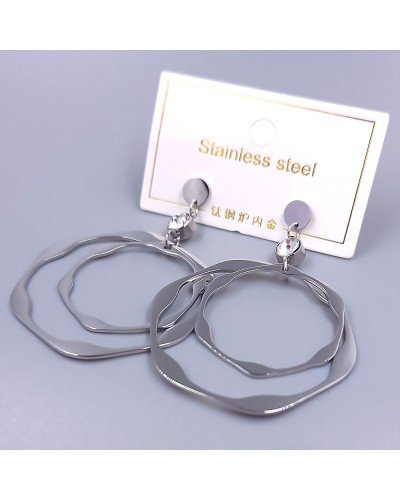 Сережки-гвоздики Stainless Steel. Сталь. Родій. Камені: білий циркон. Довжина: 56 мм. Ширина: 40 мм.