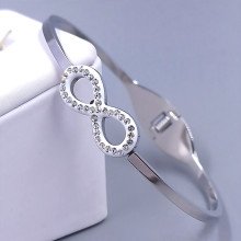 Жорсткий браслет Stainless Steel. Сталь. Родій. Діаметр: 63 мм. Ширина: 11 мм.