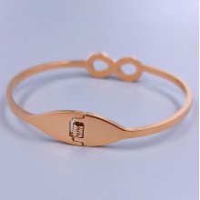 Жорсткий браслет Stainless Steel. Сталь. Позолота ЧВ. Діаметр: 63 мм. Ширина: 11 мм.