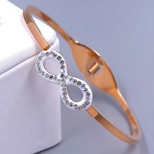 Жорсткий браслет Stainless Steel. Сталь. Позолота ЧВ. Діаметр: 63 мм. Ширина: 11 мм.