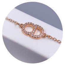 Браслет Stainless Steel. Сталь. Позолота ЧВ. Камені: білий циркон та перли. Довжина: 18-22 см