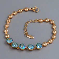 Браслет XР. Позолота 18К. Камені: Swarovski з бірюзово-синім відтінком. Довжина: 17-20 см.