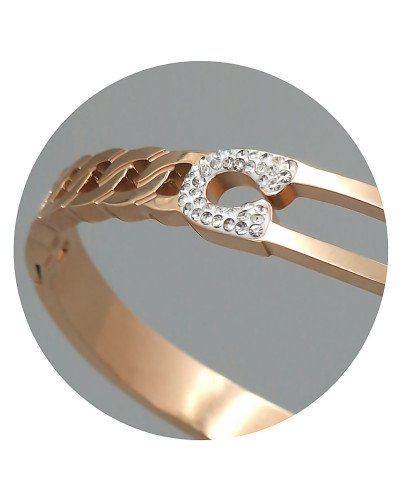 Жорсткий браслет Stainless Steel. Сталь. Позолота ЧВ. Камені: білий циркон. Діаметр: 62 мм. Ширина: 7 мм.