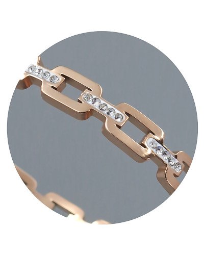 Жорсткий браслет Stainless Steel. Сталь. Позолота ЧВ. Камені: білий циркон. Діаметр: 62 мм. Ширина: 6 мм.