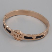 Жорсткий браслет Stainless Steel із чорною емаллю. Сталь. Позолота ЧВ. Діаметр: 62 мм. Ширина: 14 мм.