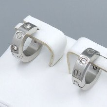Сережки Stainless Steel. Сталь. Родій. Камені: білий циркон. Діаметр: 13 мм. Ширина: 4 мм.