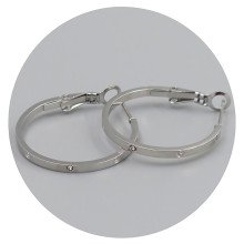 Сережки Stainless Steel. Сталь. Родій. Камені: білий циркон. Діаметр: 26 мм. Ширина: 1,8 мм.