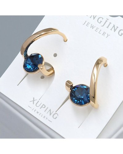 Сережки XР. Позолота 18К. Камені: Swarovski темно-синього кольору. Діаметр: 17 мм. Ширина: 12 мм.
