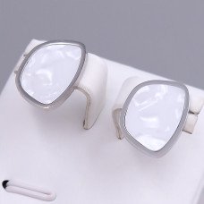 Сережки-гвоздики Stainless Steel з білою емаллю. Сталь. Родій. Довжина: 17 мм. Ширина: 12 мм.
