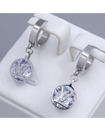 Сережки Stainless Steel. Сталь. Родій. Камені: білий циркон. Довжина: 30 мм. Ширина: 10 мм.