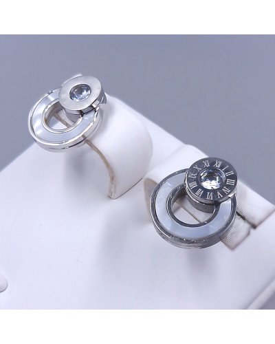 Сережки-гвоздики Stainless Steel з білою емаллю. Сталь. Родій. Довжина: 13 мм. Ширина: 11 мм.