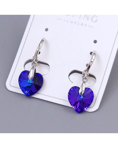 Сережки ХР. Родій. Камені: Swarovski з синьо-фіолетовим відтінком. Довжина: 25 мм. Ширина: 10 мм.