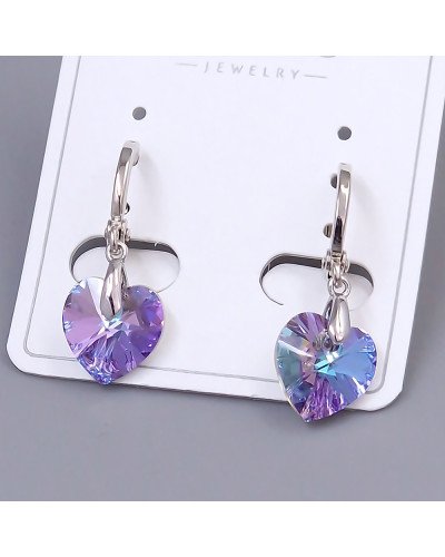 Сережки ХР. Родій. Камені: Swarovski з ніжно блакитно-фіолетовим відтінком. Довжина: 25 мм. Ширина: 10 мм.
