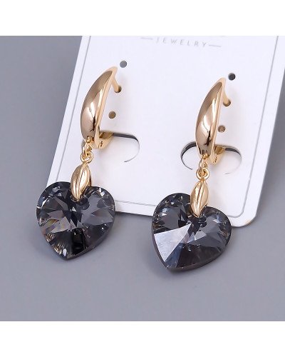 Сережки XР. Позолота 18К. Камені: Swarovski чорного кольору. Довжина: 40 мм. Ширина: 14 мм.