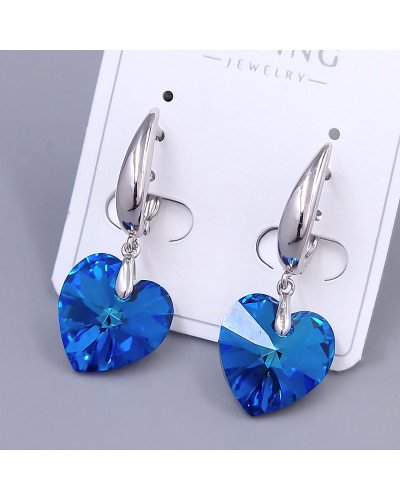 Сережки ХР. Родій. Камені: Swarovski синьо-бірюзового кольору. Довжина: 36 мм. Ширина: 13 мм.
