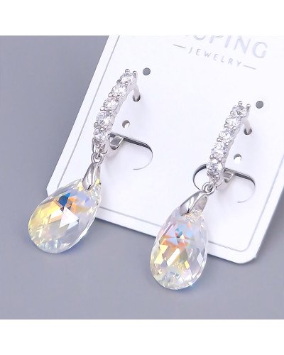 Сережки ХР. Родій. Камені: Swarovski бензинового кольору та циркон. Довжина: 34 мм. Ширина: 9 мм.