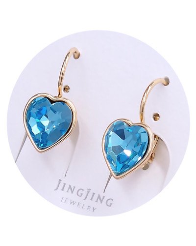 Сережки XР. Позолота 18К. Камені: Swarovski бірюзового кольору. Довжина: 19 мм. Ширина: 10 мм.