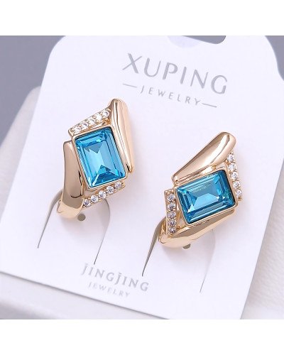 Сережки XР. Позолота 18К. Камені: Swarovski бірюзового кольору та циркон. Довжина: 20 мм. Ширина: 12 мм.