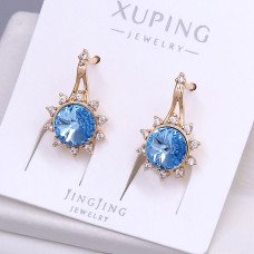 Сережки XР. Позолота 18К. Камені: Swarovski блакитного кольору та циркон. Довжина: 19 мм. Ширина: 11 мм.