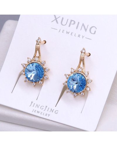 Сережки XР. Позолота 18К. Камені: Swarovski блакитного кольору та циркон. Довжина: 19 мм. Ширина: 11 мм.