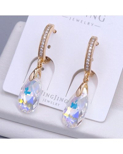 Сережки XР. Позолота 18К. Камені: Swarovski бензинового кольору та циркон. Довжина: 36 мм. Ширина: 9 мм