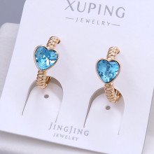 Сережки XР. Позолота 18К. Камені: Swarovski блакитного кольору. Діаметр: 15 мм. Ширина: 6 мм