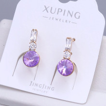 Сережки XР. Позолота 18К. Камені: Swarovski ніжно-фіолетового кольору та циркон. Довжина: 20 мм. Ширина: 8 мм.