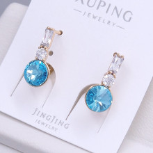 Сережки XР. Позолота 18К. Камені: Swarovski блакитного кольору та циркон. Довжина: 20 мм. Ширина: 8 мм.