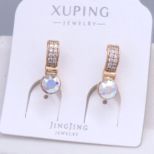 Сережки XР. Позолота 18К. Камені: Swarovski бензинового та циркон. Довжина: 18 мм. Ширина: 6 мм.