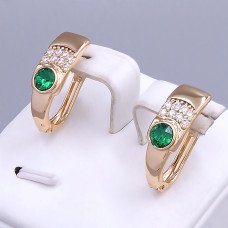 Сережки XР. Позолота 18К. Камені: Swarovski зеленого кольору та циркон. Довжина: 20 мм. Ширина: 7 мм.