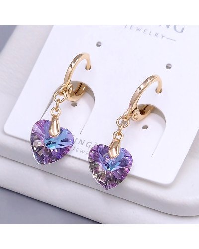 Сережки XР. Позолота 18К. Камені: Swarovski ніжно-фіолетовий хамелеон. Довжина: 22 мм. Ширина: 9 мм.