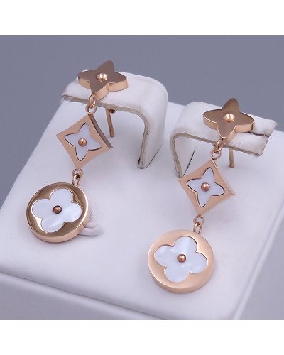 Сережки-гвоздики Stainless Steel з білою емаллю. Сталь. Позолота ЧВ. Довжина: 36 мм. Ширина: 12 мм.