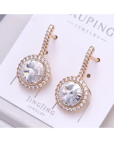 Сережки XР. Позолота 18К. Камені: Swarovski та циркон. Довжина: 23 мм. Ширина: 12 мм.