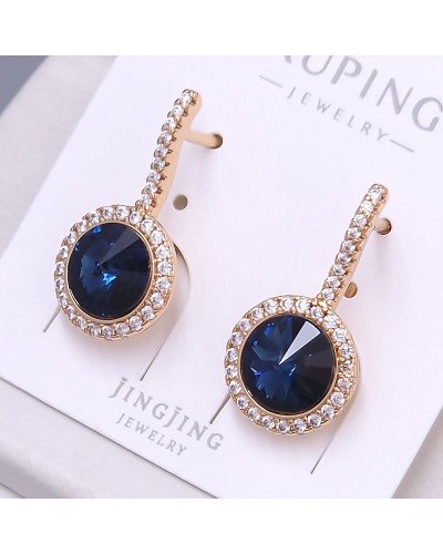 Сережки XР. Позолота 18К. Камені: Swarovski та циркон. Довжина: 23 мм. Ширина: 12 мм.