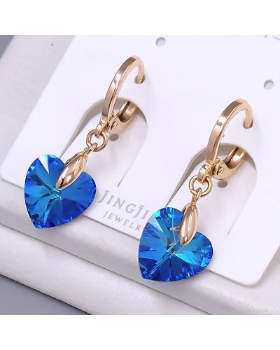 Сережки XР. Позолота 18К. Камені: Swarovski. Довжина: 26 мм. Ширина: 10 мм.