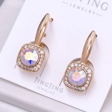 Сережки XР. Позолота 18К. Камені: Swarovski бензинового кольору та циркон. Довжина: 24 мм. Ширина: 9 мм.
