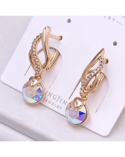 Сережки XР. Позолота 18К. Камені: Swarovski бензинового кольору та циркон. Довжина: 27 мм. Ширина: 7 мм.