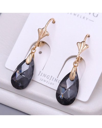 Сережки XР. Позолота 18К. Камені: Swarovski чорного кольору. Довжина: 35 мм. Ширина: 10 мм.