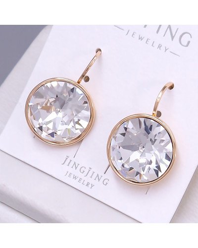 Сережки XР. Позолота 18К. Камені: Swarovski білого кольору. Довжина: 20 мм. Ширина: 15 мм.